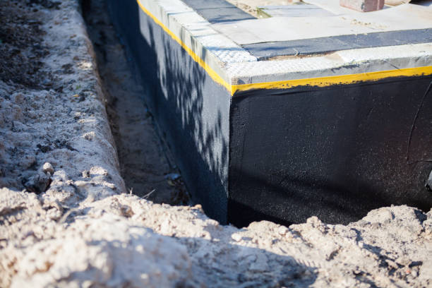 Professional Waterproofing technician working in Oakwood, PA
